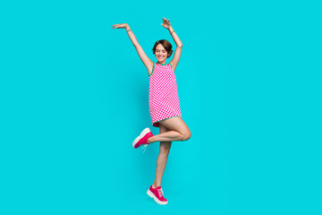 Poster - Full length photo of cheerful optimistic girl wear nice clothes preparing celebration hands up good mood isolated on cyan color background