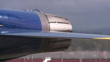 THRUSTERS OPENING ON BLUE ANGEL JET ON RUNWAY