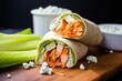 buffalo chicken wrap with blue cheese dressing and celery