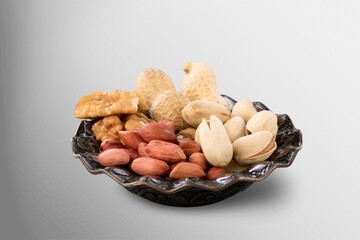 Sticker - Mix of tasty dry nuts and fruits on the desk