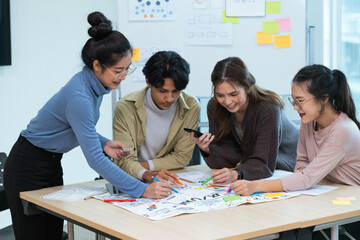 Wall Mural - creative digital development agency brainstorming about mobile app interface wireframe design on desk at modern office