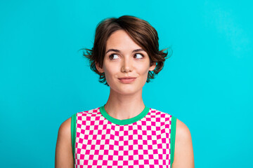 Poster - Photo of adorable lovely girl wear trendy plaid clothes looking banner blank space isolated on cyan color background