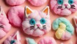 Colorful cotton candy in the shape of cute cat. Top view, sweet background, backdrop