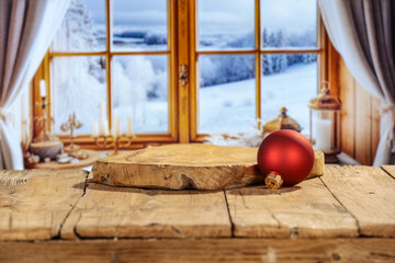 Poster - Desk of free space and christmas balls. Blurred window background and winter time. 