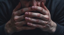 Close-up Of Hands Shaking With Fear, Illustrating Nervousness And Apprehension.