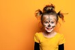 Portrait of smiling child girl having fun at carnival party. Halloween party concept. Web banner.