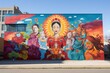 Urban mural showcasing icons of peace and love across different cultures.