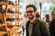 An eco-conscious urban dweller, keen on sustainable fashion, is engrossed in browsing through a collection of bamboo eyewear at a pop-up store