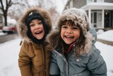 Fototapeta Las - Portrait of happy little kids playing outside in the snow