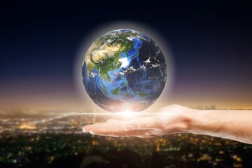Wall Mural - planet earth globe in the human hands