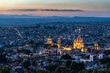 © Claudio Briones - Night view of San Miguel de Allende, Guanajuato with the Parroquia de San Miguel Arcángel and plaza Allende, Mexico. World Heritage Site. Magic town