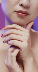 Sticker - Vertical video of asian woman with make up and red nails, copy space, slow motion