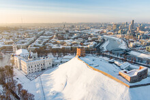 Beautiful Sunny Vilnius City Scene In Winter. Aerial Early Evening View. Winter City Scenery In Lithuania.