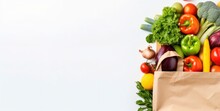 Healthy Food In Paper Bag Vegetables And Fruits On White Background.