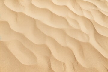 Closeup of sand pattern of a beach in the summer.