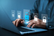 © Thapana_Studio - Cybersecurity and data protection, businessman using laptop internet network security, protect business and financial transaction data from cyber attack, user private data security encryption.