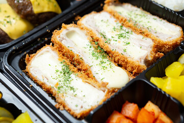 Canvas Print - Cheese pork cutlet on a plate