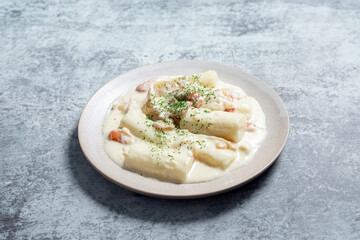 Poster - Cream sauce tteokbokki on a plate