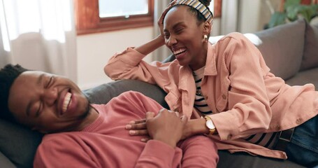 Poster - Funny, home and black couple on a couch, relax and weekend break with humor, love and marriage. African man, apartment and woman on a couch, relationship and laughing with joke and bonding together