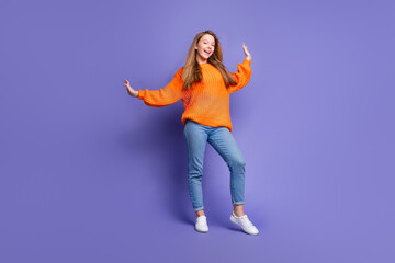 Sticker - Full length photo of graceful young girl dance relaxed happy halloween party raised hands up having fun isolated on violet color background