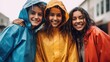 © iuricazac - Friends in raincoats share laughter and happiness on a rainy day.