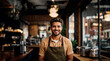© Mer Sanchez - Happy young waiter, small business coffee shop owner looking at the camera. Medium body shoot. Handsome gorgeous young model man, dark hair. For advertising, ad, ads resource. Indoors selective focus.