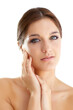 © Tasneem/peopleimages.com - Skincare, woman and portrait with makeup, cosmetics and dermatology on white background. Studio, face and girl with confidence and pride in skin at spa or salon for beauty, facial or self care