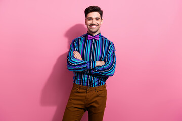 Poster - Portrait of positive classy successful young man toothy smile folded arms posing isolated on pink color background