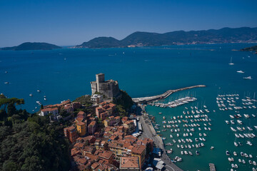 Wall Mural - Yachts and boats. Aerial view of Lerici Castle. Italian resorts on the Ligurian coast aerial view. Beautiful aerial view of the coastal Italian city of Lerici.