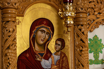 Wall Mural - Orthodox icons on a church pulpit. When worshipers enters the church they will kiss this icon and cross themselves.