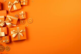 Fototapeta  - Orange gift boxes placed on an orange background, the concept of discounts. Space for text.