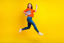 Full Body Photo Of Stylish Trendy Girl Jump Hold Laptop Isolated On Yellow Color Background