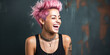 Stylish woman with pink hair laughing against black wall.