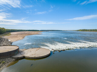 Wall Mural - Low Water Dam with interlocking sheet piling, a rapid and fisihing beach on the Mississippi RIver below Chain of Rocks