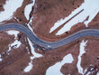 © ADDICTIVE STOCK - Aerial view of road amidst snow