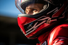 Racer's gaze from behind a vivid red helmet