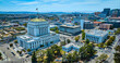 Aerial Alameda County Superior Courthouse in downtown Oakland California with distant San Francisco