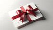 3D illustration of an unmarked white gift voucher, elegantly wrapped with a glossy red ribbon in the form of a bow. It lies on a neutral grey surface, giving off a gentle shadow and promoting a minima