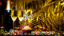 Copy Space Solemn Background. Happy Birthday Golden Background With Number  34. Greeting Card Or Postcard With A Bottle Of Champagne With Poured Champagne In Glasses.