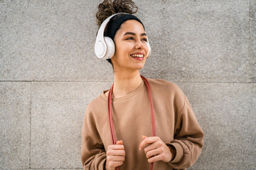 Wall Mural - one woman young adult caucasian female with jumping rope training