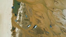 Aerial View Of Small Boats Stranded In The Nearly Dry Bed Of The Tapajos River In Alter Do Chao, Santarem, Brazil, During The Amazonian Drought In The Second Half Of 2023