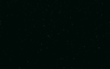 Wall Mural - falling snow on the black sky background. selective focus. starry night sky vector background