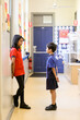© Austockphoto - primary school students together in hallway at school
