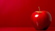 Vibrant Red Apple on Matching Red Background