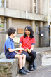 © Austockphoto - primary school students holding healthy food for fruit break