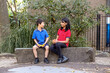 © Austockphoto - Happy primary school students on fruit break