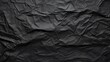 © CassiOpeiaZz - black crumpled paper on empty sheet background. copy text space.
