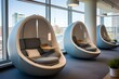 © yj - Nap pods in a modern open space office. generative AI