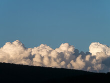 Large Cumulus Clouds With Blue Sky Above
