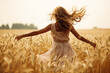 Young woman feeling relieved in beautiful nature, enjoying the summer, dancing with opened arms on the wind